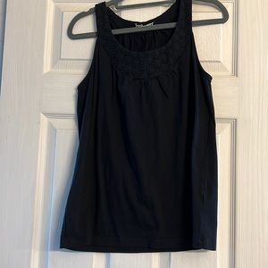 Black tank with embellishment at neck